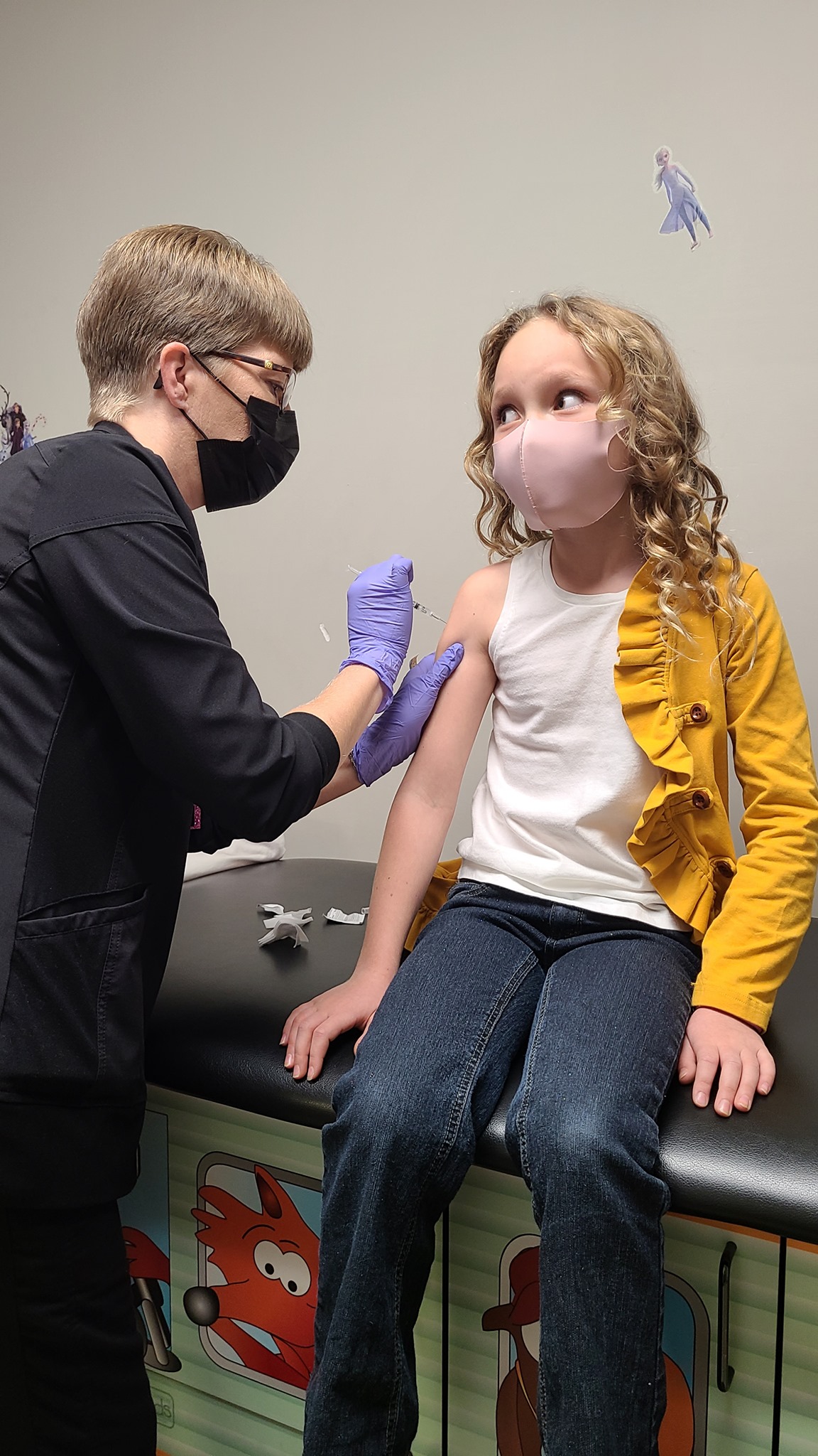 Child receiving vaccine